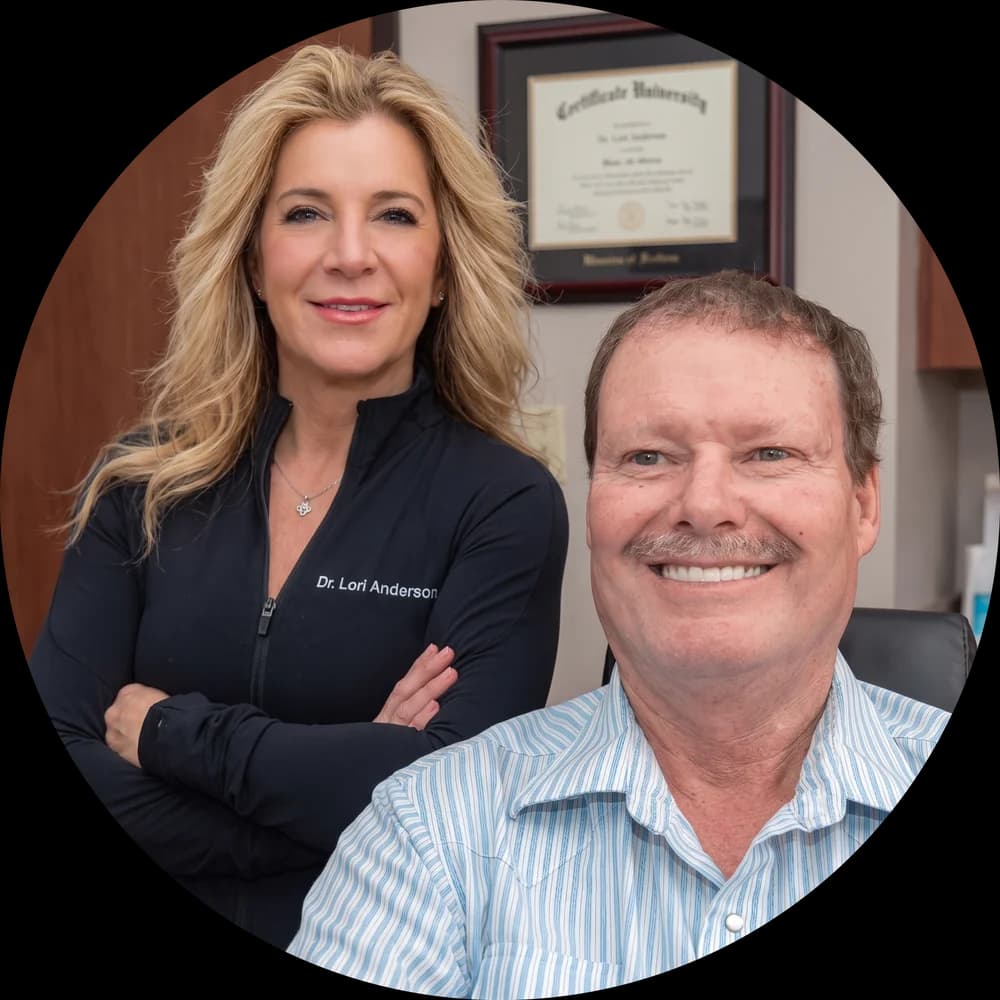 Dr. Lori Anderson with a smiling cosmetic dentistry patient