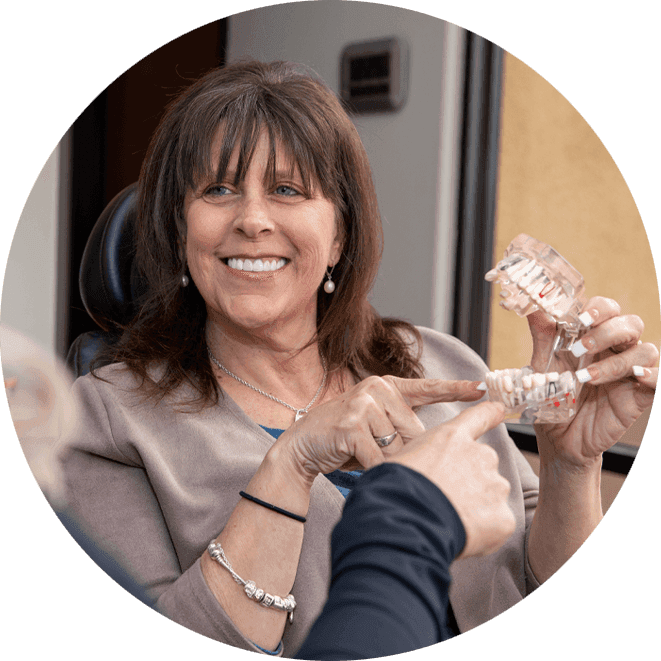 Smiling dental implant patient in Scottsdale